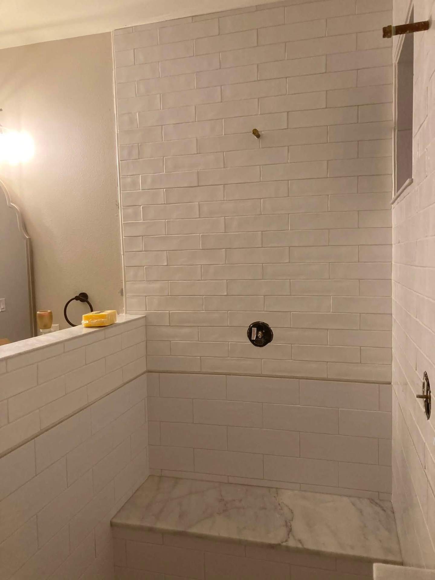 Custom shower with marble bench detail