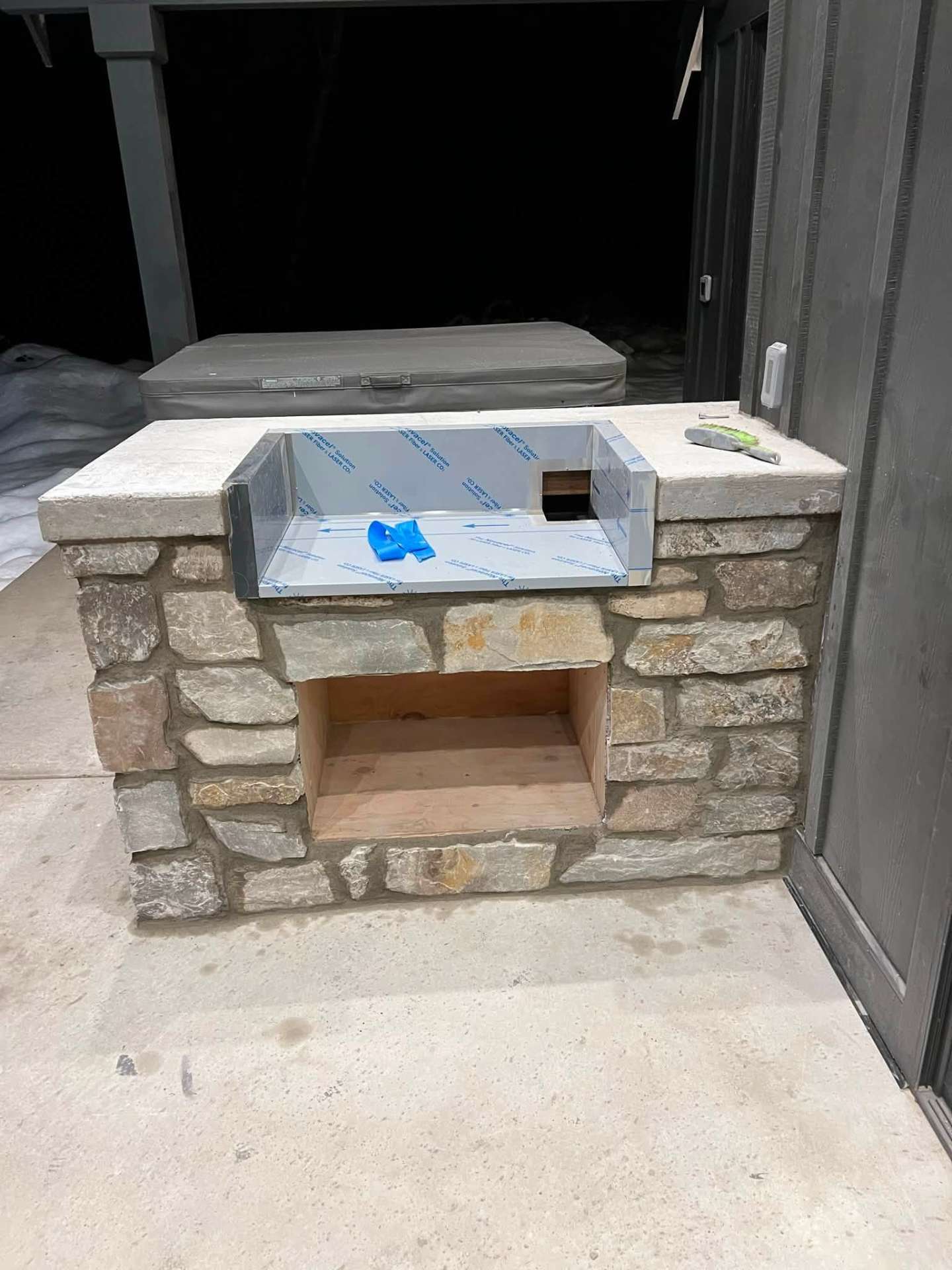 Outdoor stone bar and patio feature