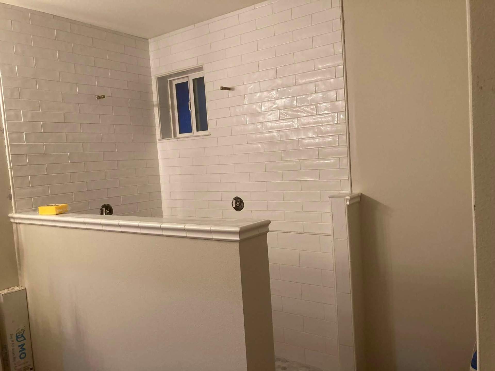 Hand-glazed subway tile bath surround